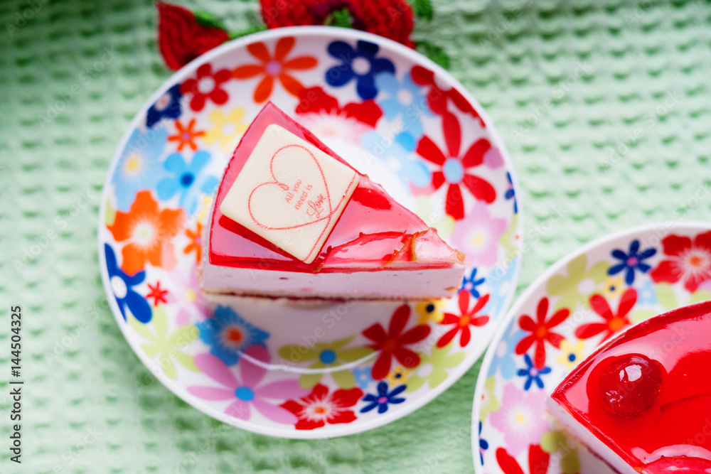 Pieces of cake on a colorful dishes Pieces of cake on a colorful dishes