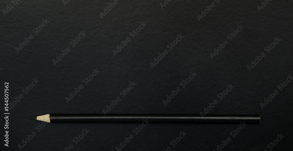 black pencil on blackboard background. black pencil on blackboard background.