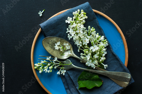 Spring table setting with white lilac
