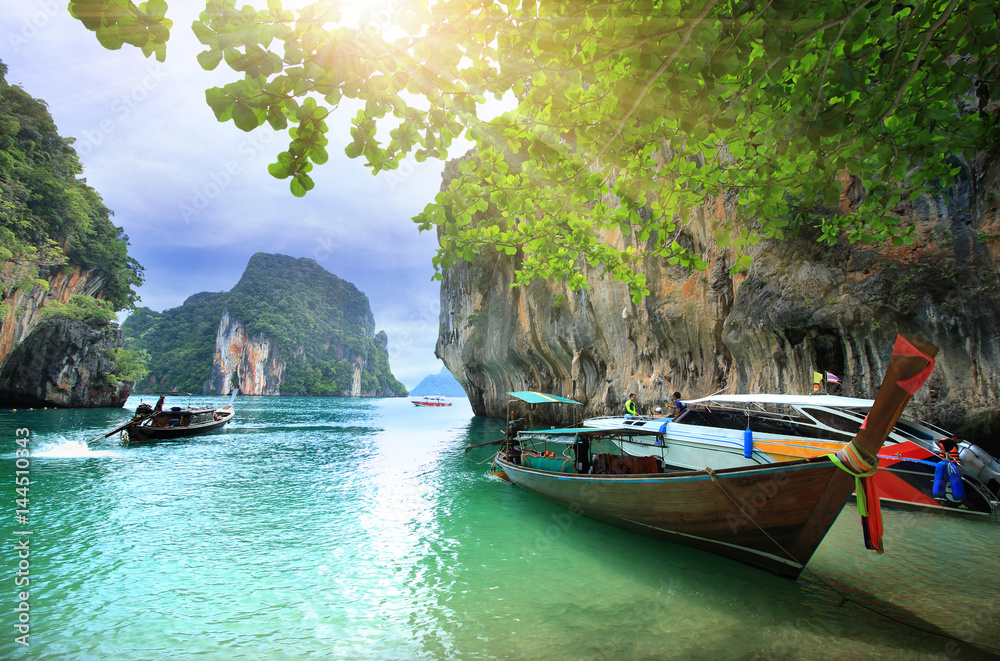 tropical holidays - amazing beaches with Longtail boat at famous sunny Long Beach, Krabi Thailand, Andaman sea
