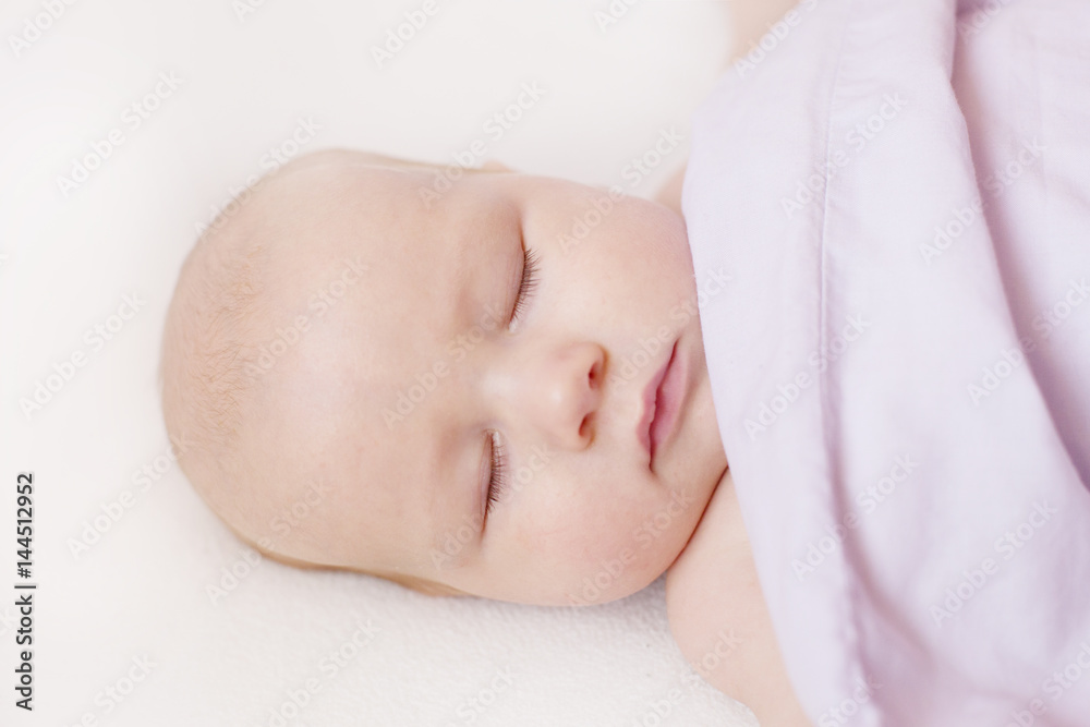 Baby sleeping under the blanket Baby sleeping under the blanket