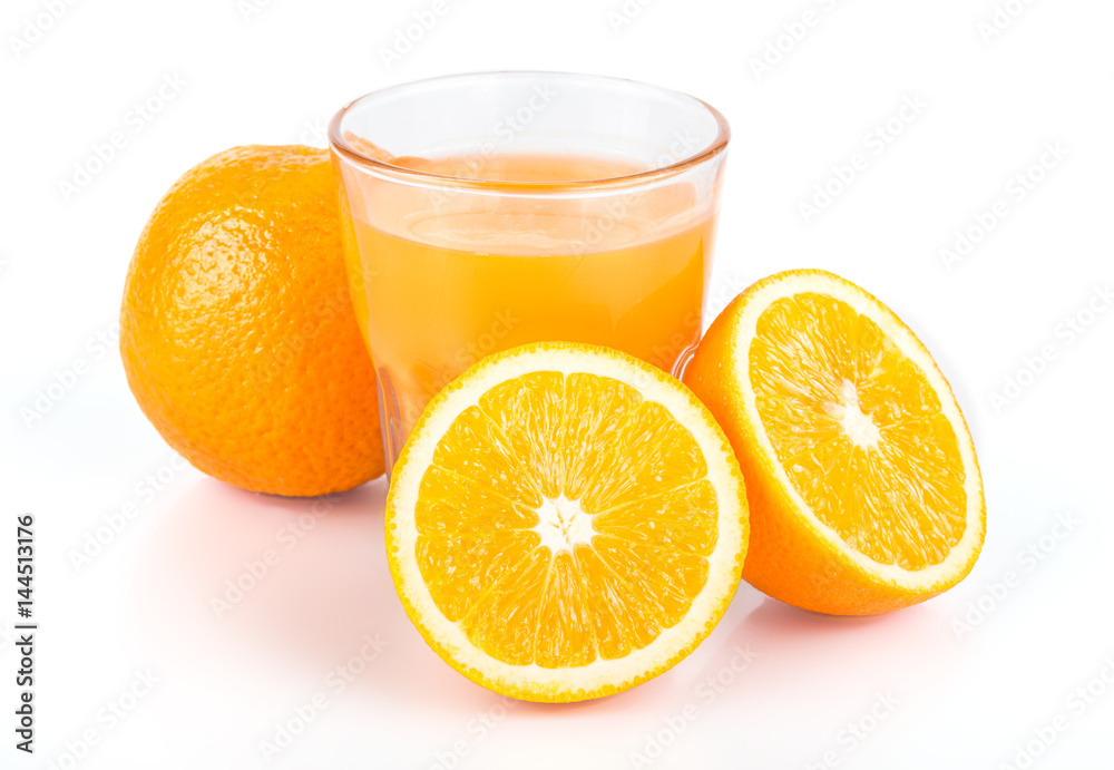 Orange juice. Isolated drink. A glass of orange juice and pieces of orange fruit isolated on white background. Citrus. Diet. Vitamins. Healthy food. Orange juice. Isolated drink. A glass of orange juice and pieces of orange fruit isolated on white background. Citrus. Diet. Vitamins. Healthy food.