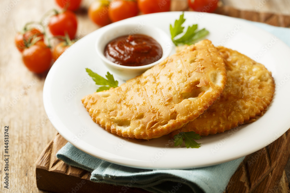 Meat pies or Chebureki Meat pies or Chebureki