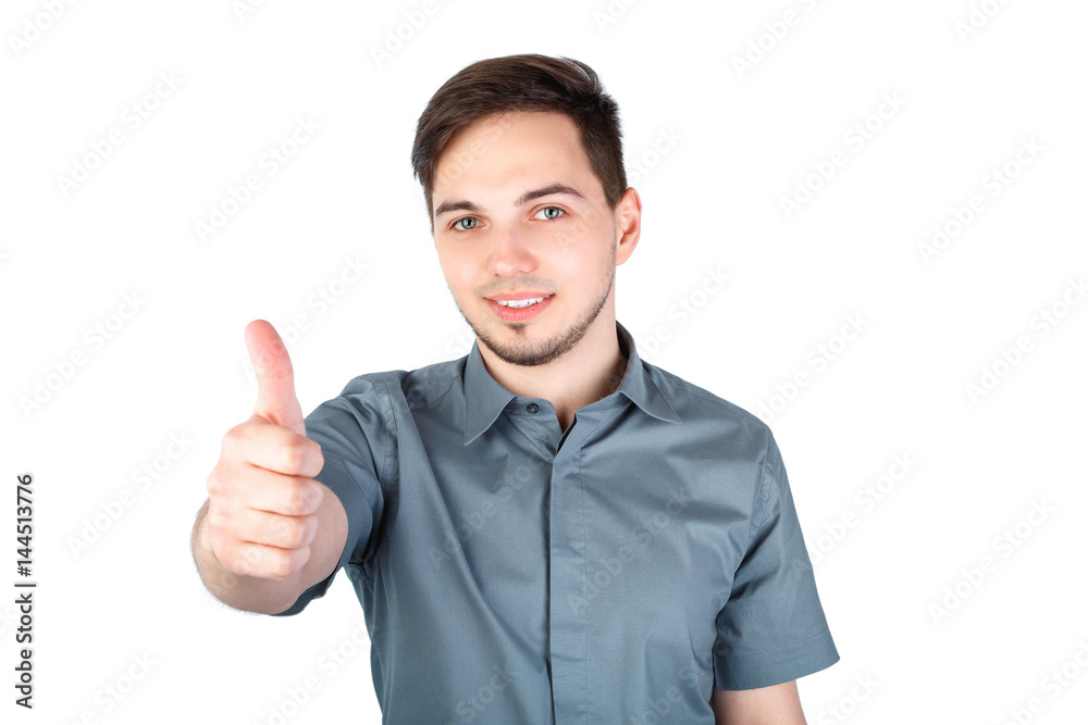 Cheerful young man showing thumbs up over white background. life style and people concept: Happy handsome man showing thumbs up over isolated background. Man on a white background. Cheerful young man showing thumbs up over white background. life style and people concept: Happy handsome man showing thumbs up over isolated background. Man on a white background.