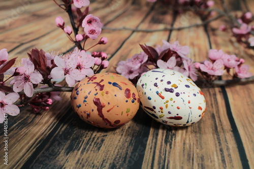Painted Easter egg with cherry branch