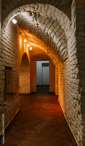 Corridor lined with brick