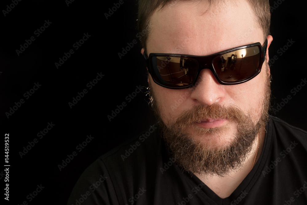 Handsome bearded man in sunglasses Handsome bearded man in sunglasses