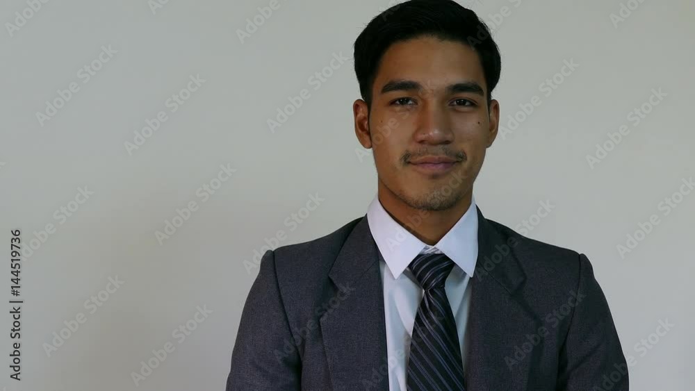 business, people, success, happiness and cheerful concept - smiling young man startup entrepreneur businessman wearing gray suit with white background business, people, success, happiness and cheerful concept - smiling young man startup entrepreneur businessman wearing gray suit with white background