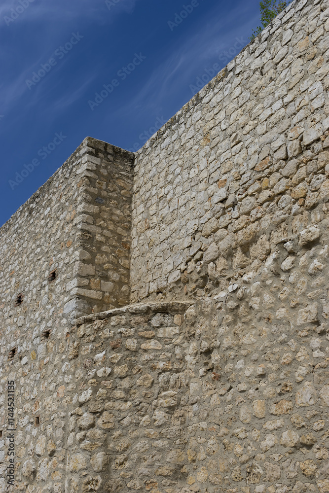 Old stone wall in the village of chinchon, madrid, spain