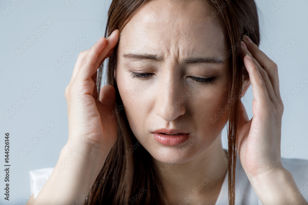 Fototapeta premium young woman have a headache