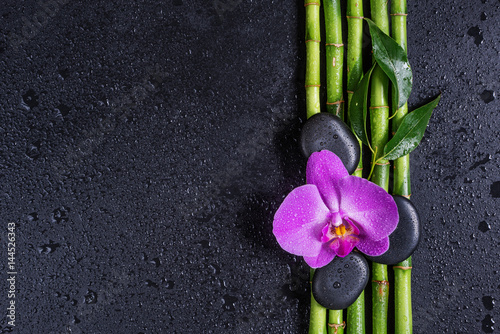 Spa concept with zen stones  orchid flower and bamboo