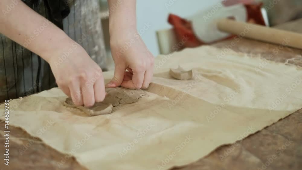 clay potter hands wheel pottery work workshop teacher and girl pupil 4k clay potter hands wheel pottery work workshop teacher and girl pupil 4k