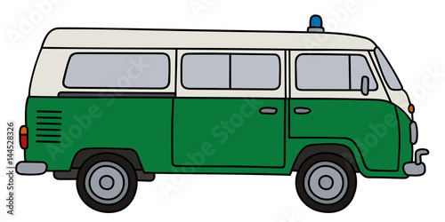 Classic green and white police minivan