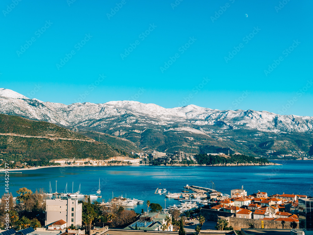 Snow-covered mountains of Budva in Montenegro, Adriatic sea