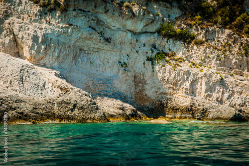 Obraz na płótnie Greece, Zakynthos, August 2016. Rocks, caves and blue water w salonie