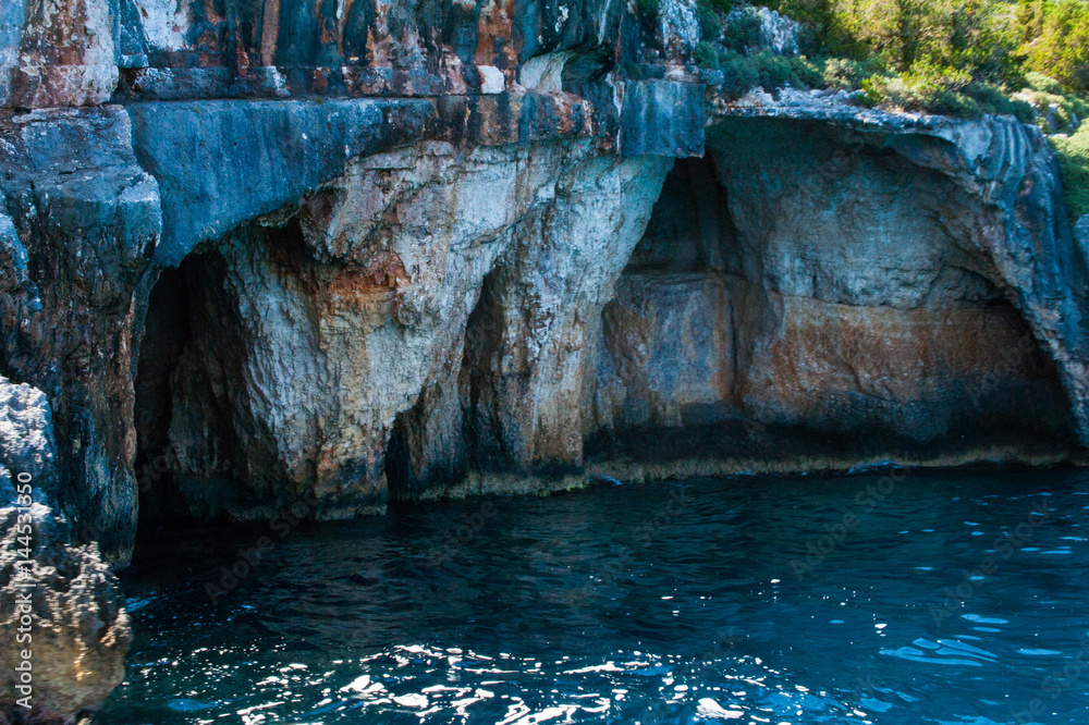 Greece, Zakynthos, August 2016. Rocks, caves and blue water
