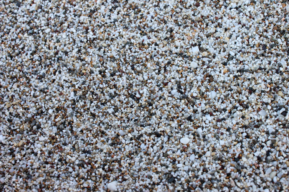 Small gray stone background, horizontal view. Small gray stone background, horizontal view.
