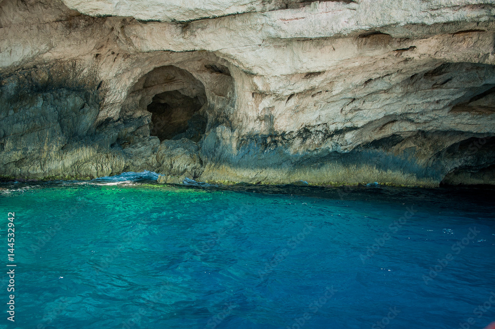 Greece, Zakynthos, August 2016. Rocks, caves and blue water