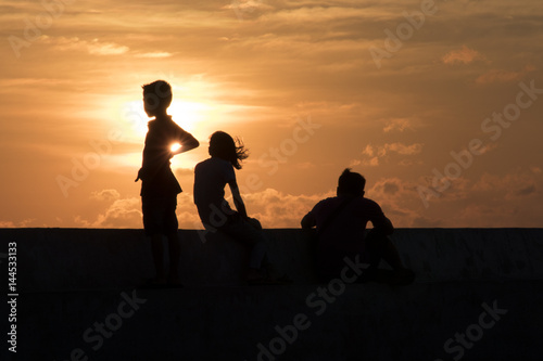 Silhouette people acting and sunset background at Bangpu Samutprakarn province dated 15.04.2017