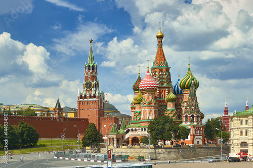 View on Moscow Red Square, Kremlin towers, stars and Clock Kuranti, Saint Basil's Cathedral church. Hotel Russia Moscow Red Square Panorama. Moscow holidays vacation tours famous sightseeing points