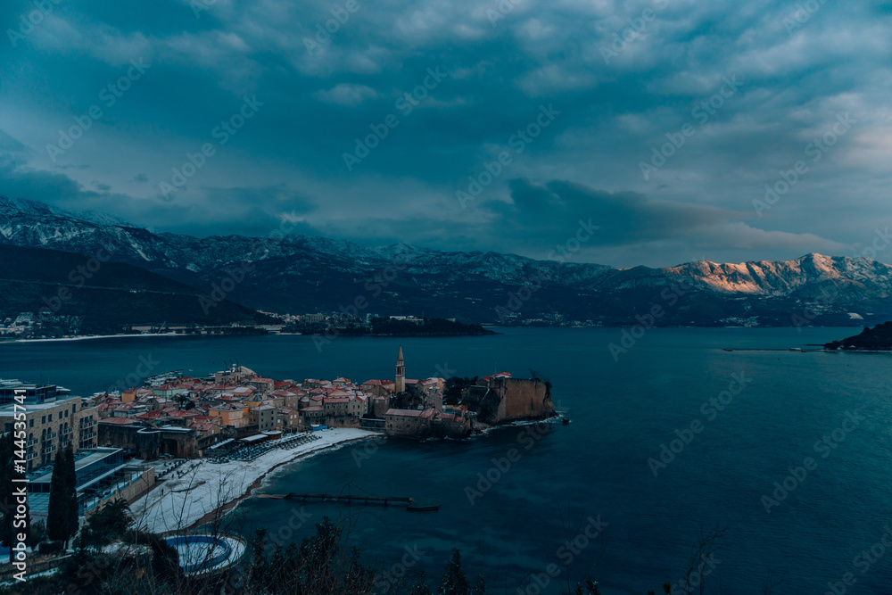 Budva's Old Town in the snow, Montenegro. The coast is covered with snow. An unusual phenomenon.