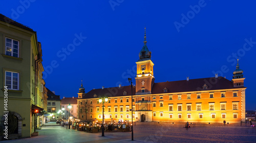 Old town in Warsaw at night. View of the castle square and the royal castle
