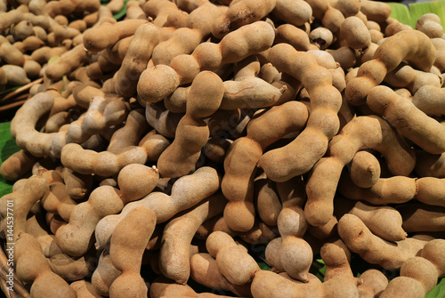 Heap of ripe Tamarind fruits, tropical tasty healthy fruits in Thailand