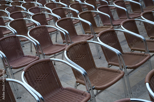a number of chairs in the hall