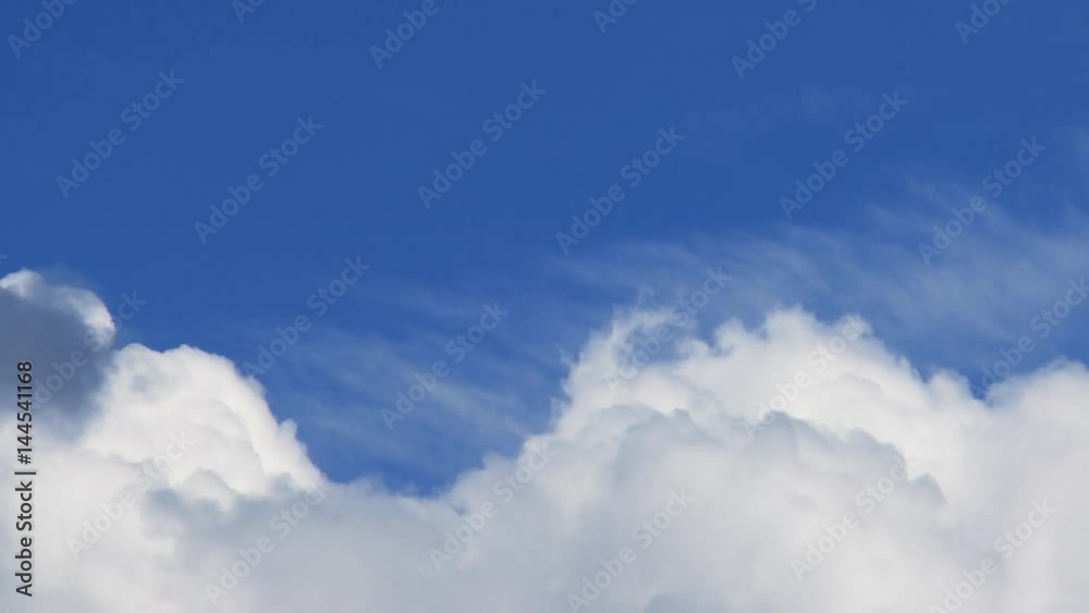 Timelapse of cumulus clouds forming on a clear blue sky Timelapse of cumulus clouds forming on a clear blue sky