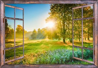 Foto auf Leinwand Schlafzimmer Sonnenaufgangsblick aus dem Fenster  © dbrus