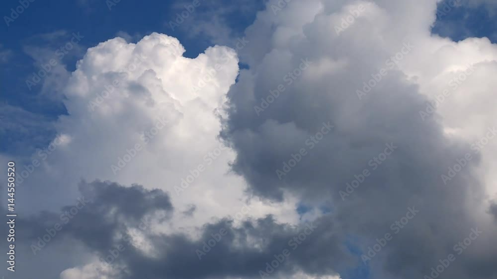 Timelapse of cumulus clouds forming on a clear blue sky Timelapse of cumulus clouds forming on a clear blue sky