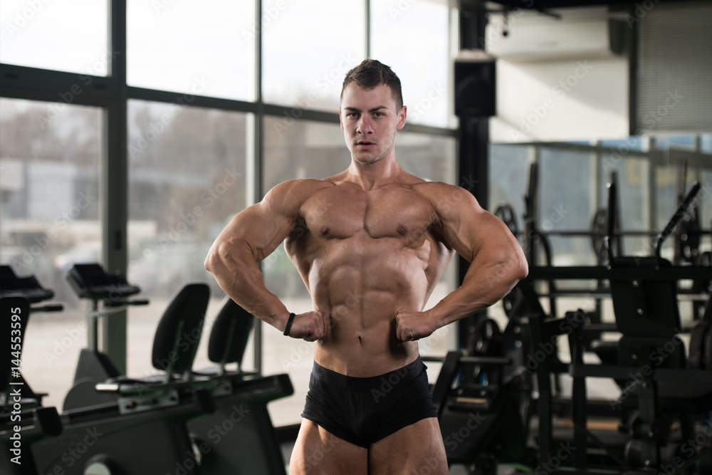 Healthy Man Showing Abdominal Muscle Healthy Man Showing Abdominal Muscle