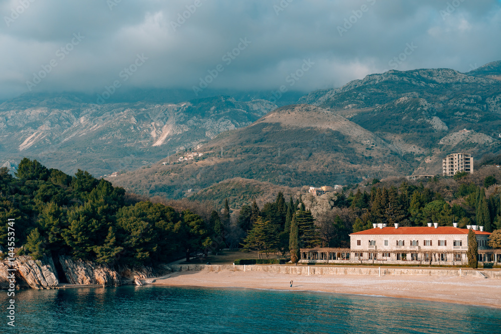 The Villa Milocer is one of the most beautiful resorts of the Budva riviera surrounded by the shady park, with the famous Queen's Beach on the foreground, Sveti Stefan, Montenegro.