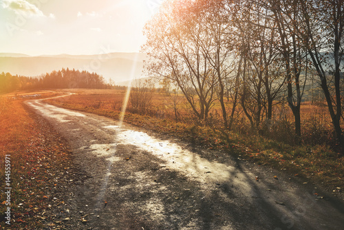 Autumn scene with road. Road in autumn mountains. Beskid Mountains. Poland