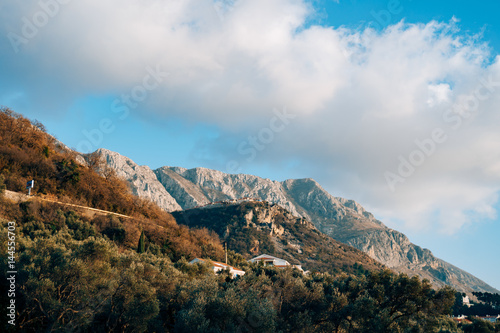 Mountain Komovi in Montenegro. Fog is falling on mountain as sun goes down. Nice as desktop background.