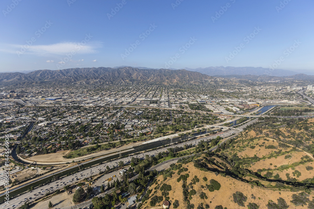 Aerial view of the Ventura 134 freeway, Griffith Park and the Los Angeles River in Southern California.  
