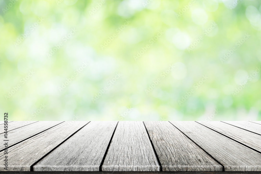 Empty wooden table with party in garden background blurred. Empty wooden table with party in garden background blurred.