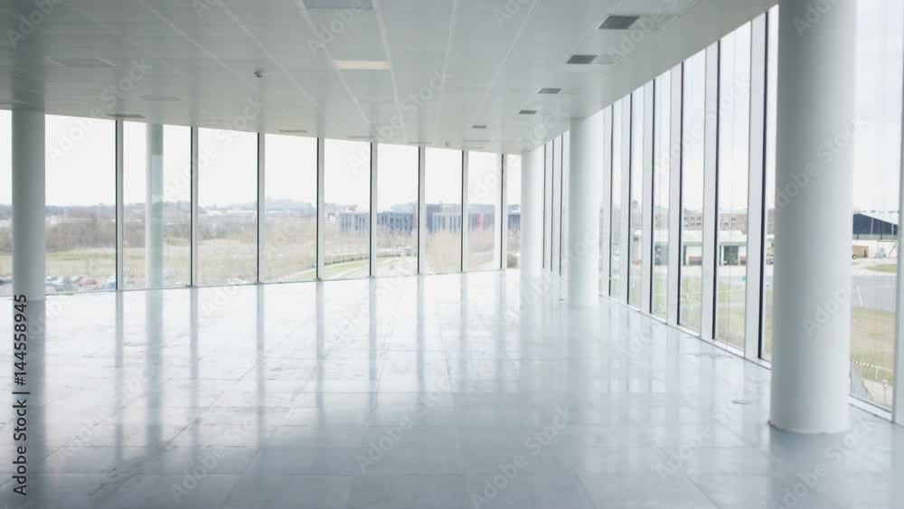  Interior view of large empty modern property with panoramic view. No people.