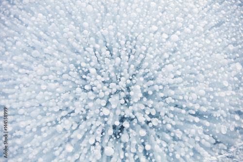 Bubbles texture. Ice of Baikal lake.