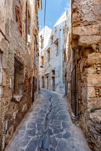 The narrow road between the houses in Chania © alexkon2000