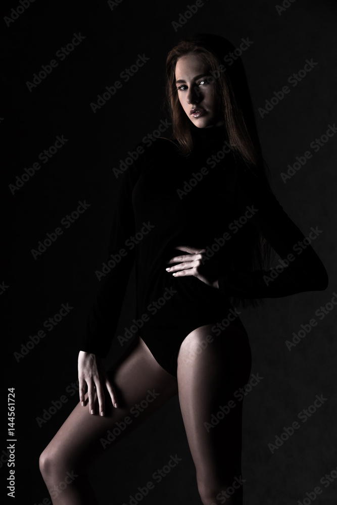 Young woman in a slim body dress Young woman in a slim body dress