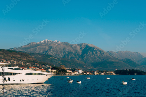 Lovcen in the snow. Snow on the mountain. View from Tivat. Waterfront Tivat in Montenegro. © Nadtochiy