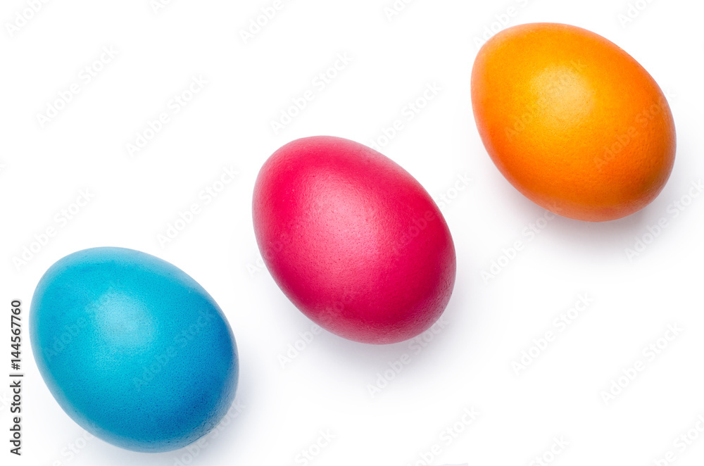 three colored eggs, isolated on white backgroung three colored eggs, isolated on white backgroung