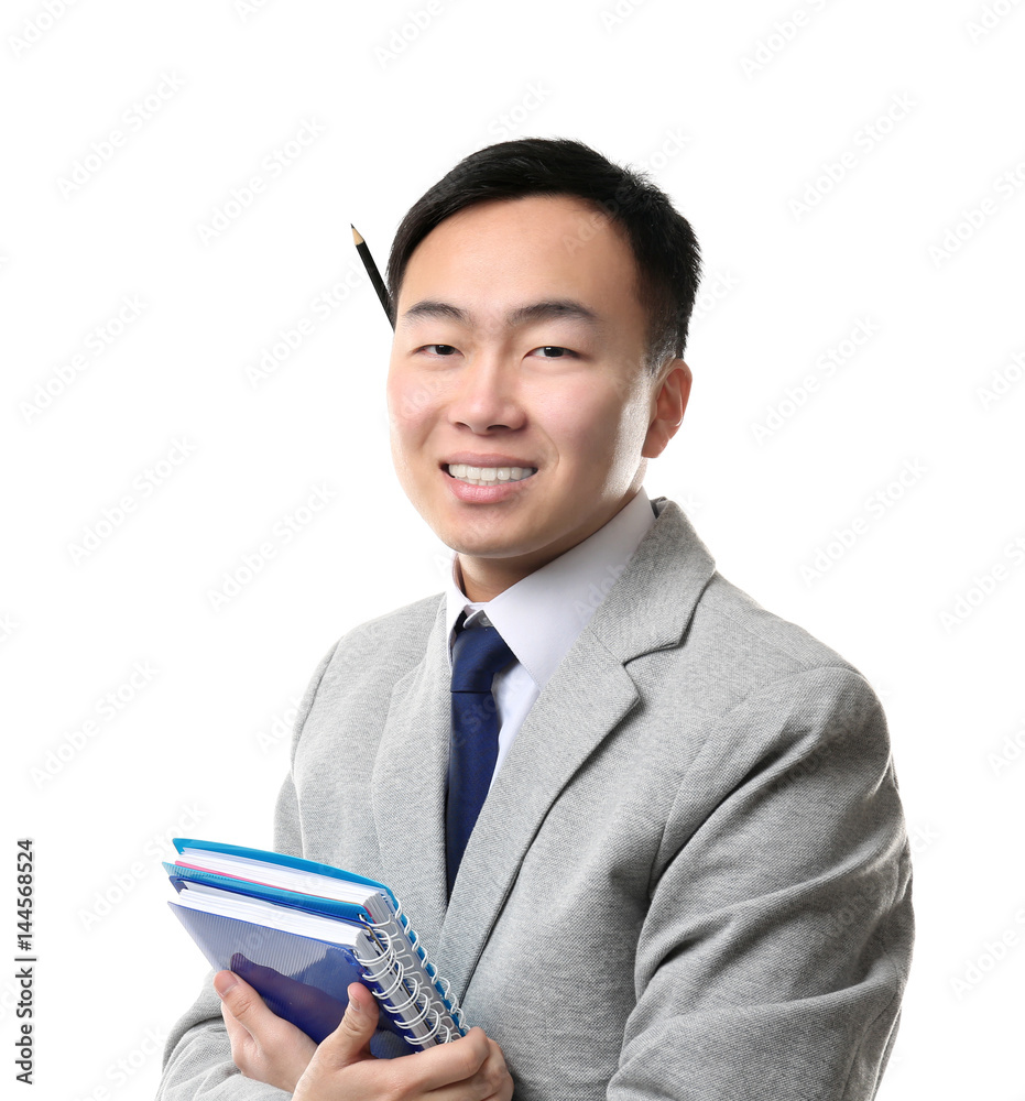 Handsome young Asian teacher on white background Handsome young Asian teacher on white background