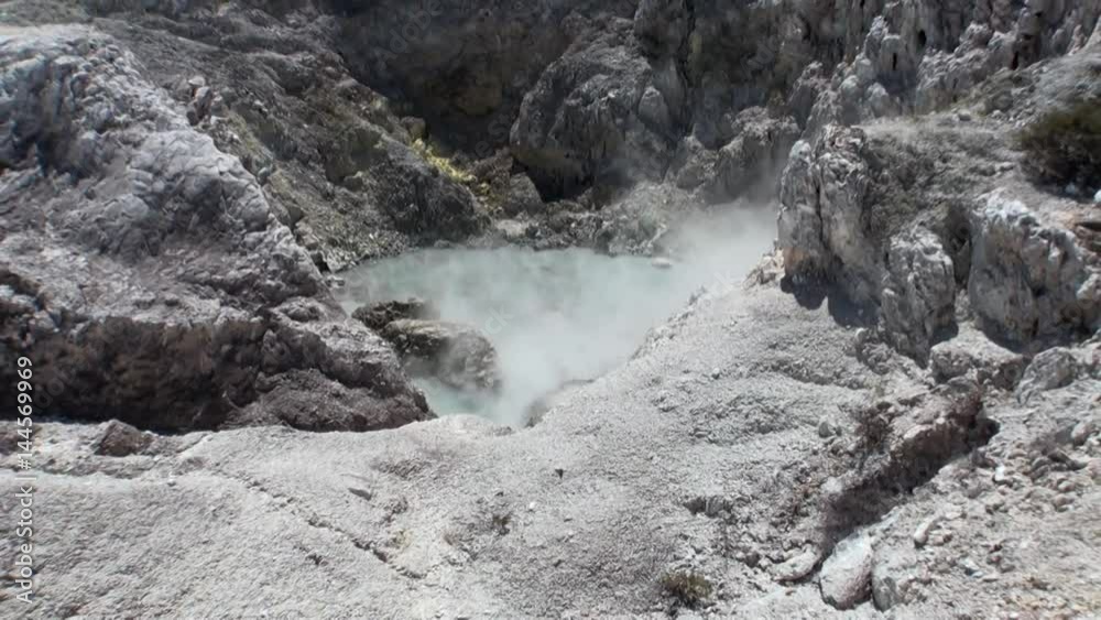 Geysers water hot springs on background of soil in New Zealand. Beautiful amazing nature. Travel and tourism in the world of wildlife.
