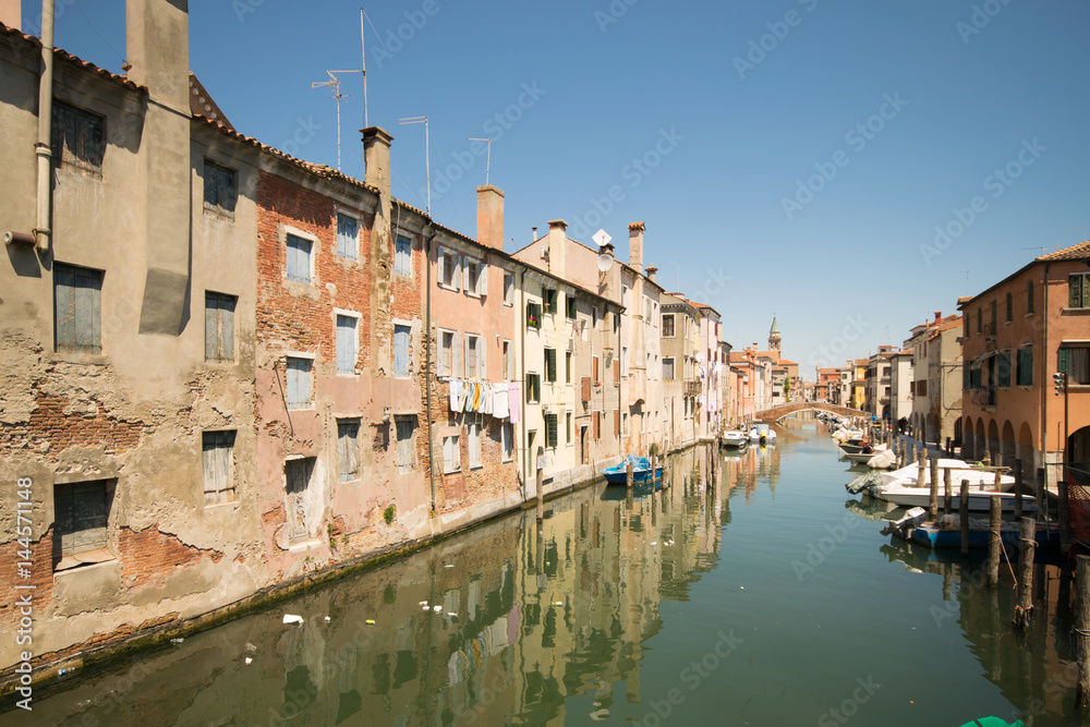 Characteristic canal in Chioggia, lagoon of Venice.