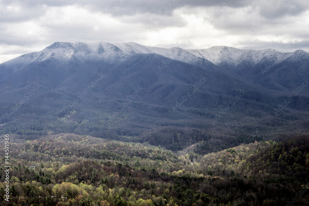 Snow capped mountains and green valley in the Smokies.