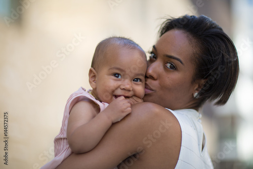 Mother and new baby outdoors