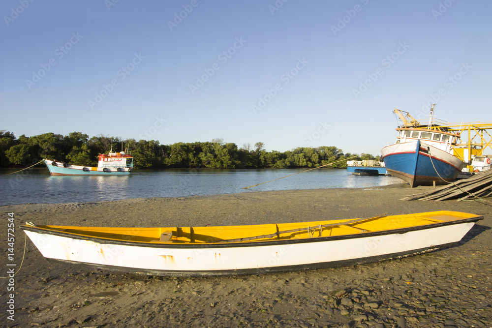 Fototapeta premium Guamaré, RN, Brazil (Fishing boats - sunset and sunshine)