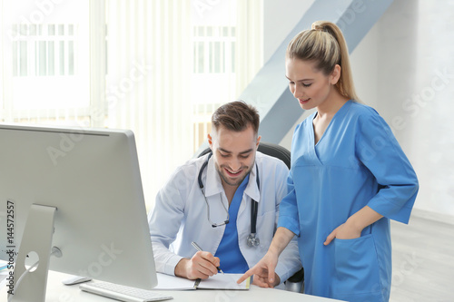 Doctor and medical assistan...